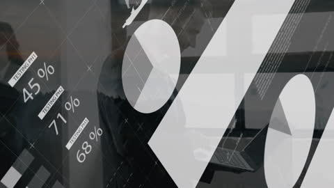 Businessman Analyzing Financial Data and Graphs on Laptop