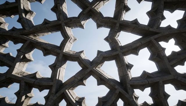 Ornate stone lattice revealing pale blue sky through star-shaped geometric openings