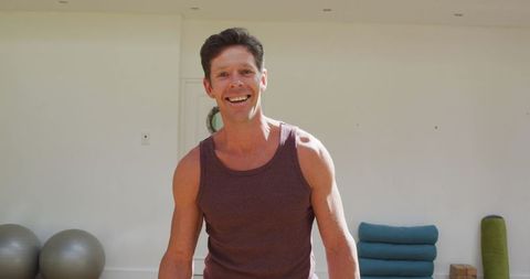 Smiling Yoga Instructor in Sunny Fitness Studio Environment - Download Free Stock Images Pikwizard.com