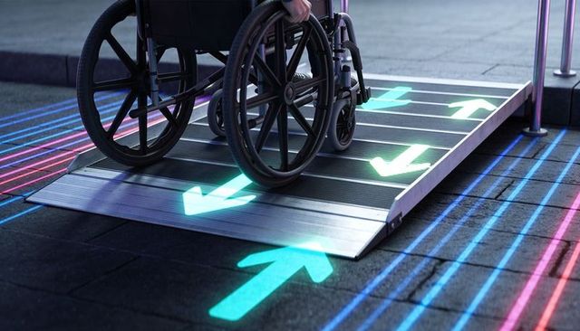 Wheelchair user pushing on neon-lit accessible ramp with glowing directional arrows