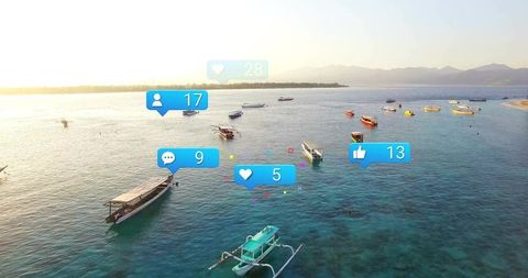 Boats on Turquoise Sea with Social Media Icons Floating Overhead