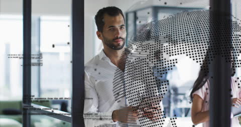 Global Business Visionary Analyzing Data in Modern Office