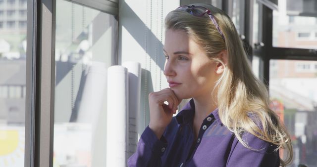 Thoughtful Woman Looking Out of Office Window During Workday - Download Free Stock Images Pikwizard.com