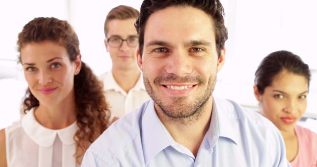 Smiling Business Team Posing for Group Portrait in Office - Download Free Stock Images Pikwizard.com