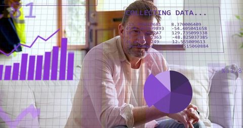 Mature man analyzing financial data on sofa at home with purple charts and graph overlays