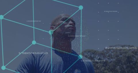 African American Technologist Engaged with Futuristic Holograph