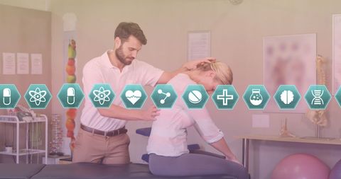 Massage Therapist Assisting Female Patient with Digital Health Icons
