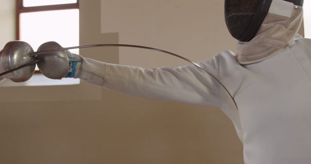 Close-Up of Fencing Duelists Sparring With Foils in White Uniform - Download Free Stock Images Pikwizard.com