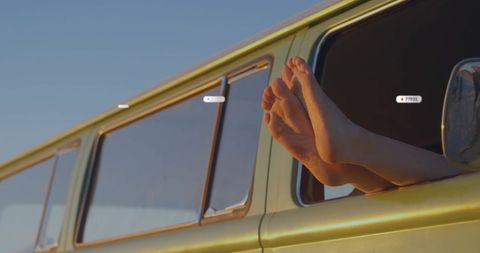 Feet out Car Window Reflecting Freedom and Relaxation