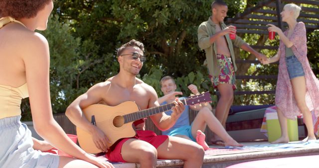 Group of Friends Enjoying Poolside Music and Refreshments on Sunny Day - Download Free Stock Images Pikwizard.com