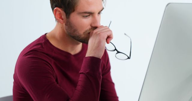 Young Man Reflecting While Working on Computer - Download Free Stock Images Pikwizard.com