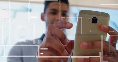 Modern Professional Using Futuristic UI on Smartphone in Office