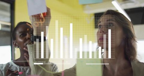 Colleagues Brainstorming with Data Visualization Overlay in Modern Office