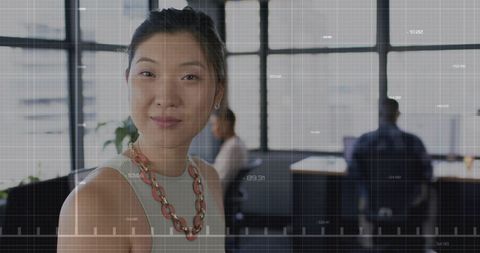 Modern Businesswoman in Data-Driven Office Environment