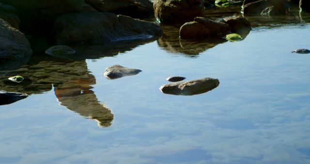 Tranquil water reflects the sky, with copy space - Download Free Stock Photos Pikwizard.com