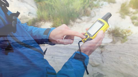 Hiker Exploring Nature Using GPS Technology