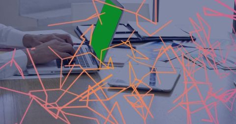 Office worker using laptop with network overlay hologram