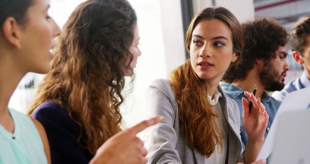 Group of Young Professionals Having a Brainstorming Session in Office - Download Free Stock Images Pikwizard.com