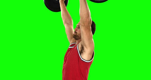 Fit Man Lifting Weights Against Green Background - Download Free Stock Images Pikwizard.com