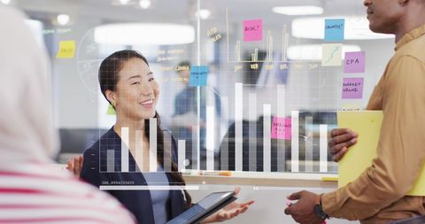 Business Team Analyzing Data with Digital Graphs and Notes - Download Free Stock Images Pikwizard.com
