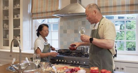 Senior Couple Cooking Together for Enriching Home Experience