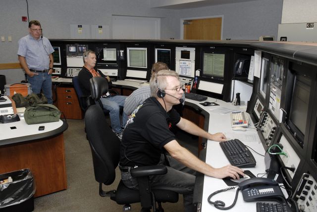 Technicians Monitoring Firing Room 4 Console at NASA’s Launch Control Center - Download Free Stock Images Pikwizard.com