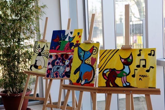 Colorful Abstract Animal Paintings Displayed on Easels in Art Studio - Download Free Stock Photos Pikwizard.com