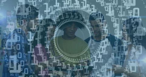 Tech Team Innovating With Tablets in Modern Office and Binary Overlay