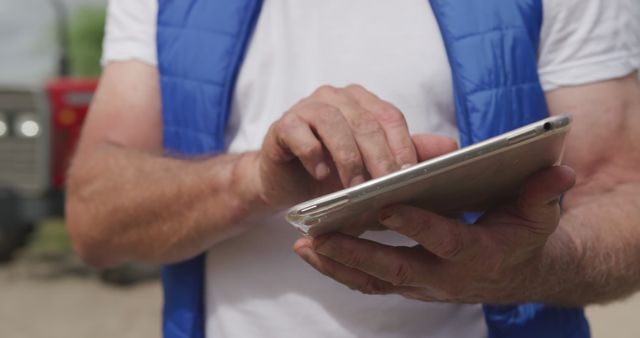 Farmer Using Digital Tablet in Field Checking Data - Download Free Stock Images Pikwizard.com