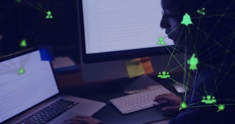 Network Connections Over Woman Using Laptop in Office