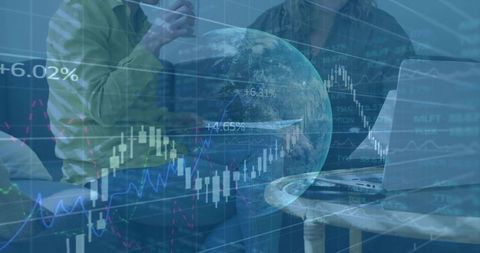 Businesswomen Reviewing Financial Analytics on Laptop with Global Data Overlay
