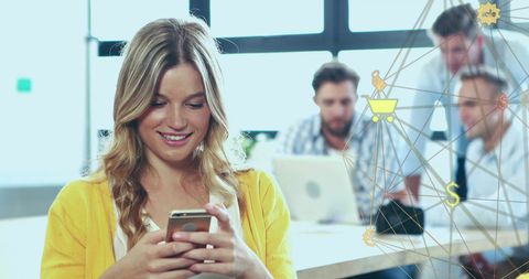 Woman Engaging with Smartphone in Modern Casual Office