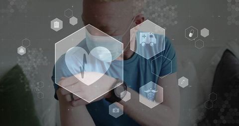 Masked man wearing smartwatch on sofa pulling sleeve up with telehealth hud overlays