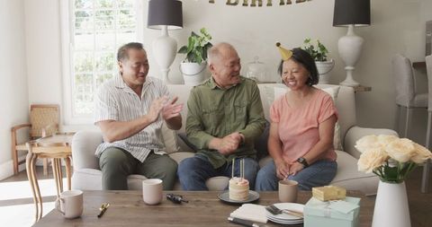 Seniors Joyfully Celebrating Birthday at Home Party
