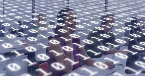 Smiling professional woman collaborating in modern office with binary code overlay