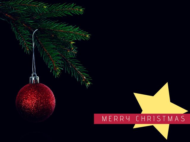 Festive image of a red glitter ornament hanging from an evergreen branch with 'Merry Christmas' text on a yellow star. Perfect for holiday cards, seasonal greetings, winter holiday promotions, and festive decorating ideas.