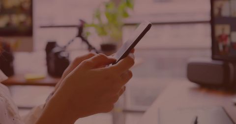 Woman Using Smartphone While Analyzing Data on Screen - Download Free Stock Images Pikwizard.com