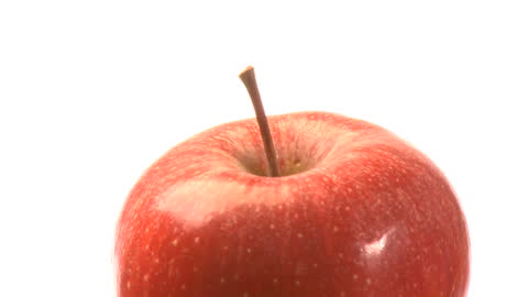 Fresh Red Apple with Stem on White Background