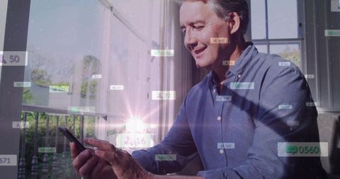 Man Monitoring Data on Smartphone at Home with Digital Overlay