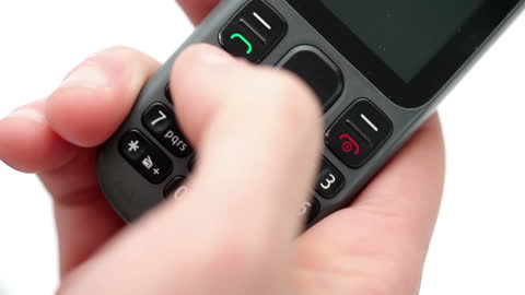 Hand Dialing Number on Mobile Phone with White Background