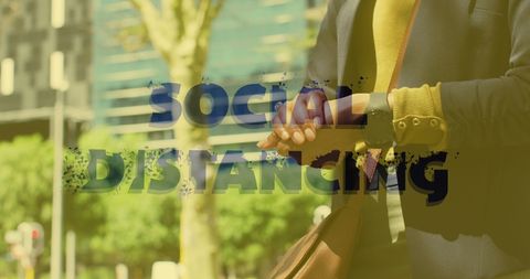 Woman Disinfecting Hands with Social Distancing Reminder