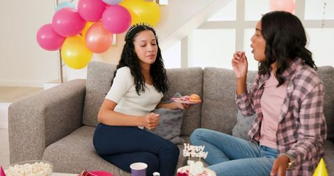 Friends Celebrating Birthday Home Party with Cake