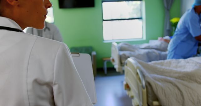 Medical Professionals Working in Hospital Room - Download Free Stock Images Pikwizard.com