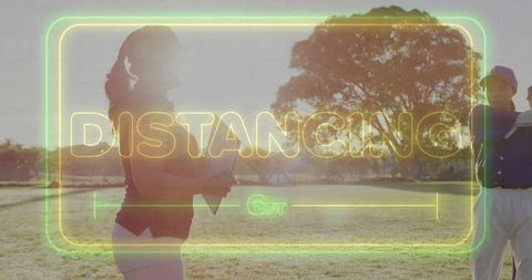 Distancing in sports coaching with neon overlay