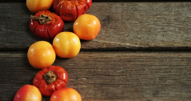 Colorful Autumn Persimmons on Rustic Wood Table - Download Free Stock Images Pikwizard.com