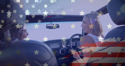 Happy Diverse Women Driving by Beach with American Patriotic Overlay