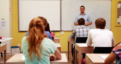 University Lecturer Engaging with Attentive Students - Download Free Stock Images Pikwizard.com