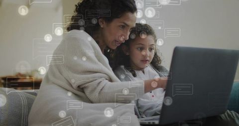 Mother and daughter learning together on laptop in cozy living room with chat overlay