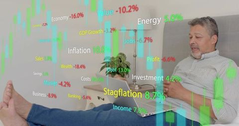 Reclining man analyzing home finance charts on laptop and smartphone with stagflation data