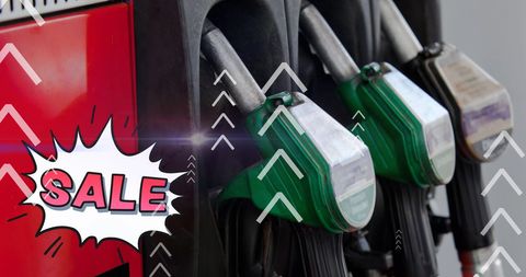 Fuel Price Sale Concept with Green Gas Nozzles - Download Free Stock Images Pikwizard.com